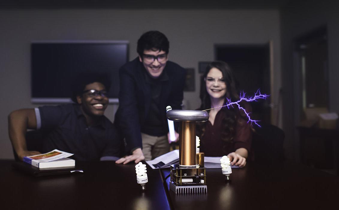 Joshua Allen and other STEM students use Tesla Coil for experiments